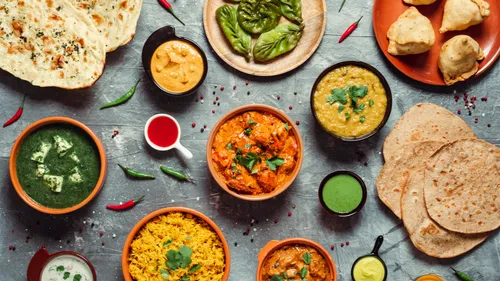 Assorted Indian dishes on a table.