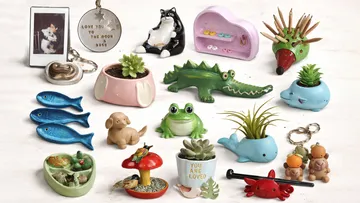 Collection of miniature animal-like figurines on table.