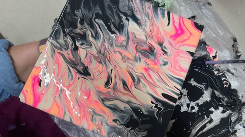 Abstract painting with swirling neon colors.