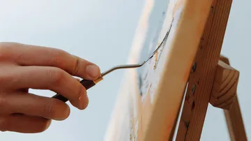 Hand painting on canvas with palette knife.