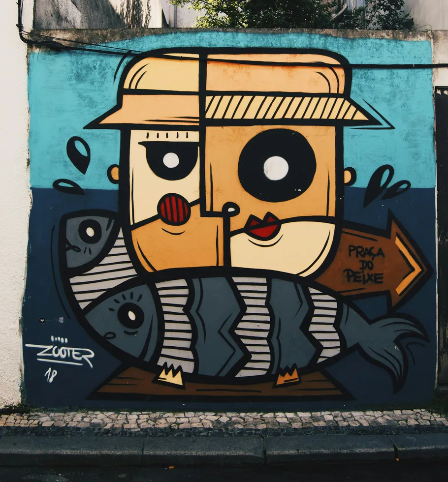 Colorful cartoon mural with abstract human face.