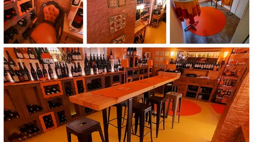 Wine cellar with bottles, stools, and orange decor.