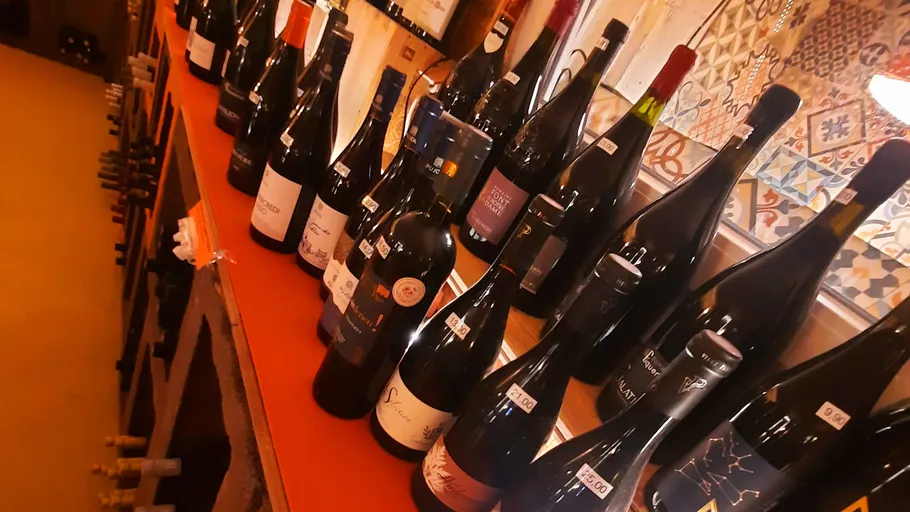 Wine bottles displayed on a table indoors.