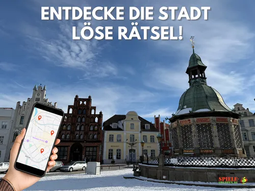 Hand holds smartphone displaying map in city square.