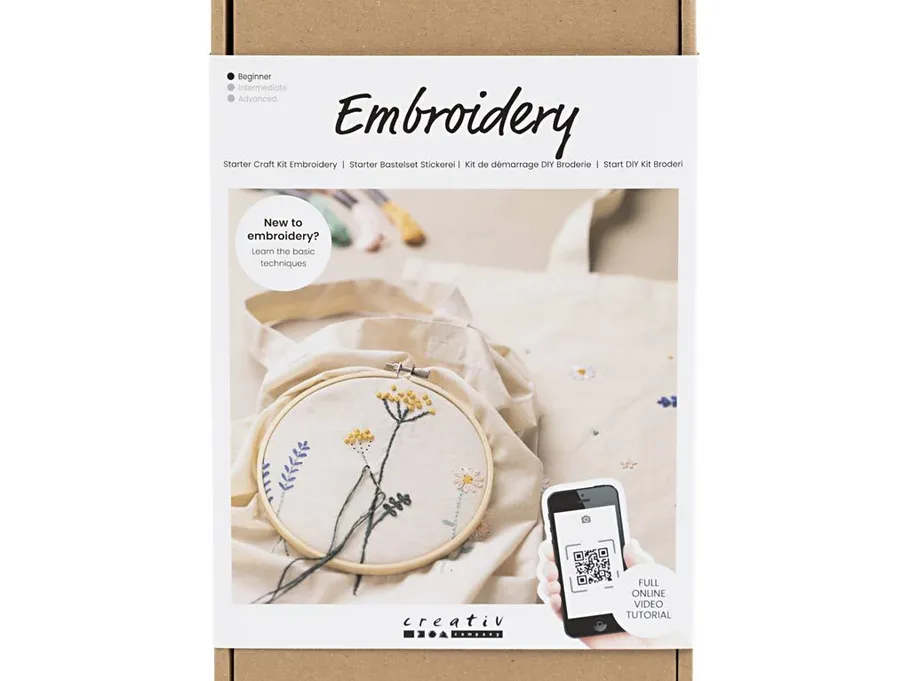 Embroidery kit with floral design in hoop.