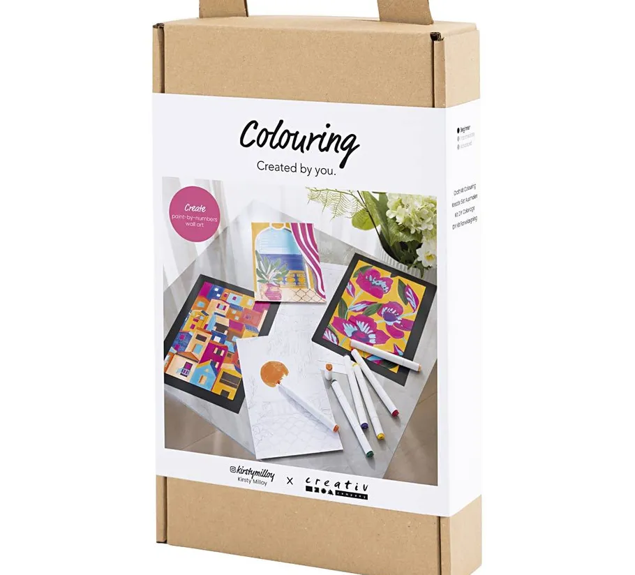 Box with coloring supplies on table.