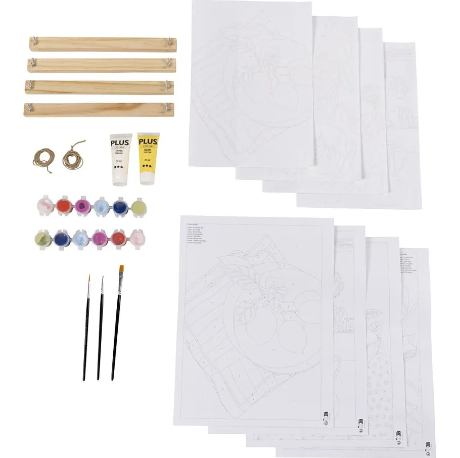 Art supplies set with paints, brushes, and canvases.