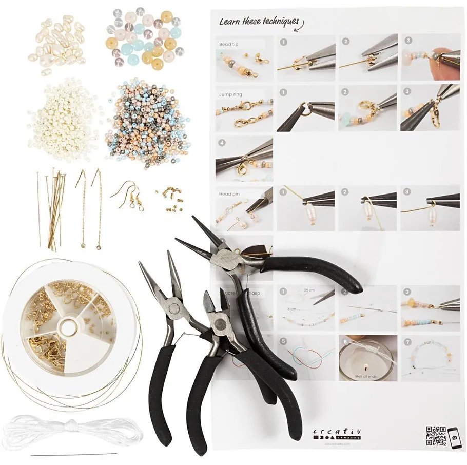 Beading kit with tools and instruction sheet.