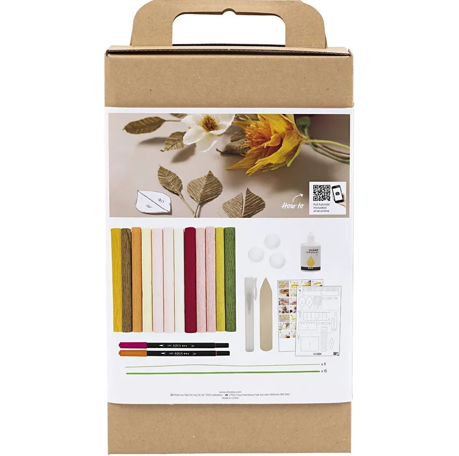 Craft kit with colored sticks and glue bottle.