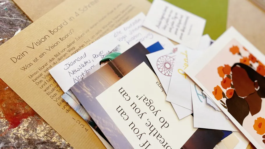 Various pictures and notes are on a table.
