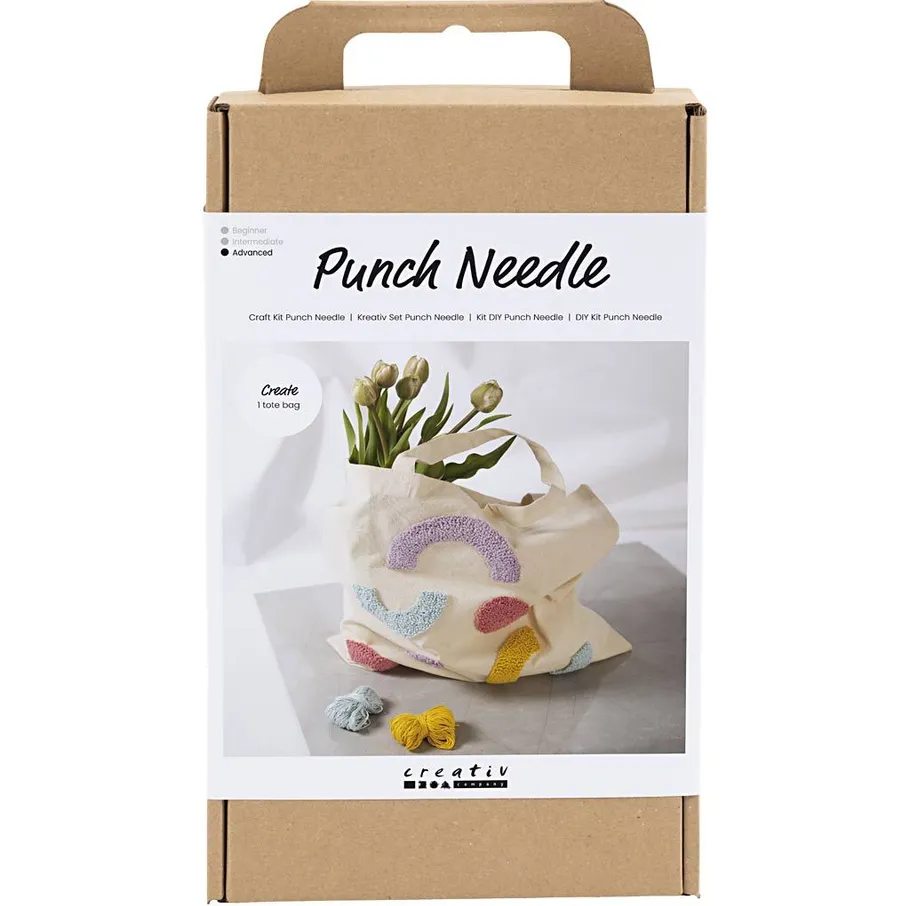 Bastelset-Verpackung mit einem Punch-Needle-Einkaufsbeutel.