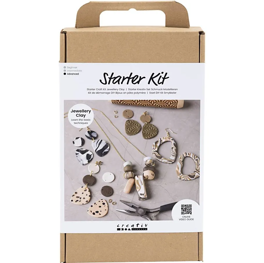 Jewelry clay starter kit with tools and components.
