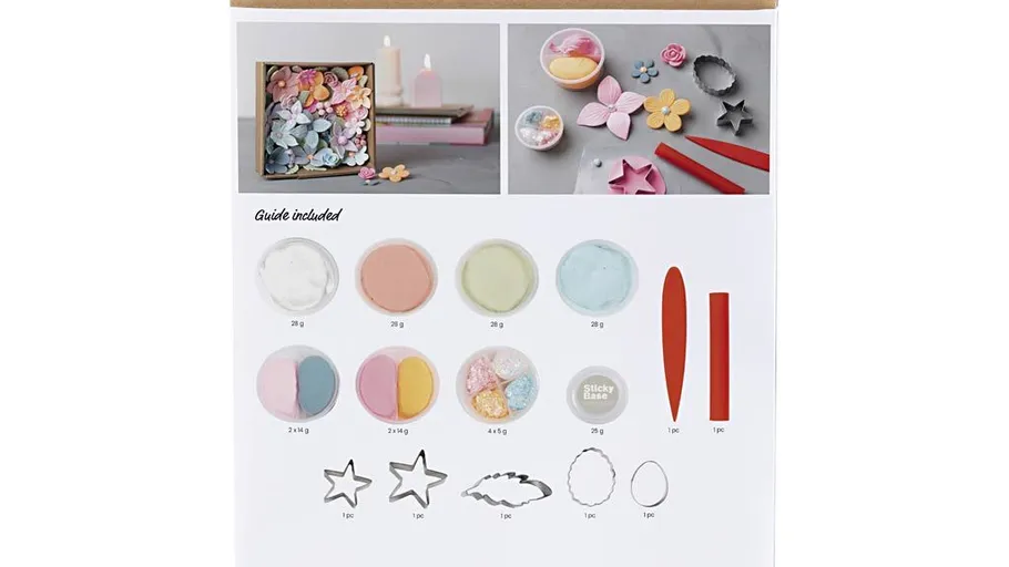 Clay crafting kit with tools and materials displayed.