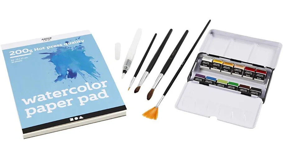 Watercolor set with brushes and paper pad.
