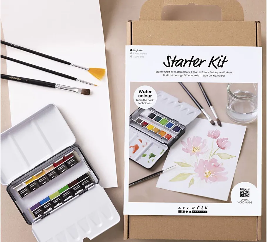 Watercolor starter kit with brushes and paints.
