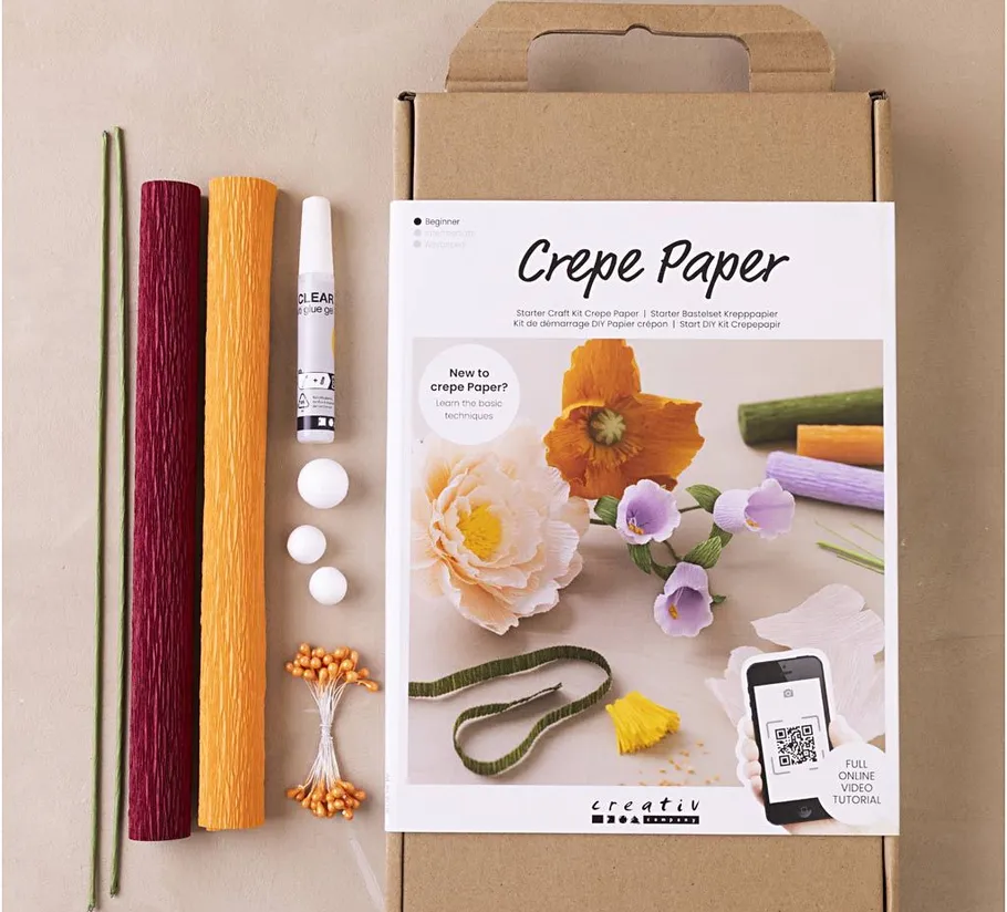 Crepe paper craft kit with colorful materials.