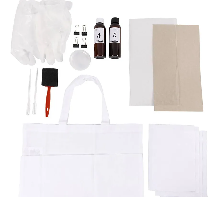 Crafting kit with various tools and materials.
