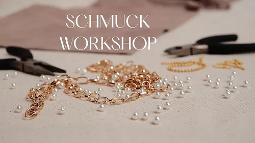 Schmuckwerkzeuge und Perlen auf dem Tisch.