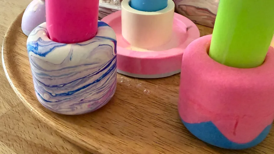 Colorful wooden stacking toys on a wooden table.