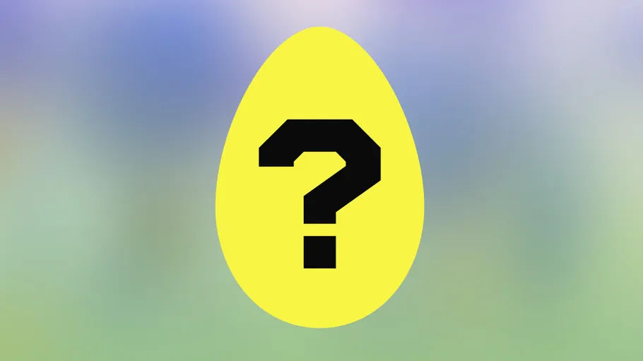 Yellow egg with black question mark, blurred background.