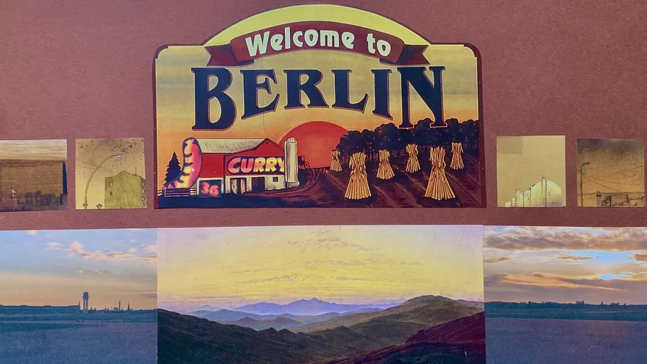 Berlin-Willkommensschild mit Landschaftsbildern.