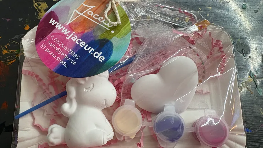 Painting kit with colorful paints and unicorn.