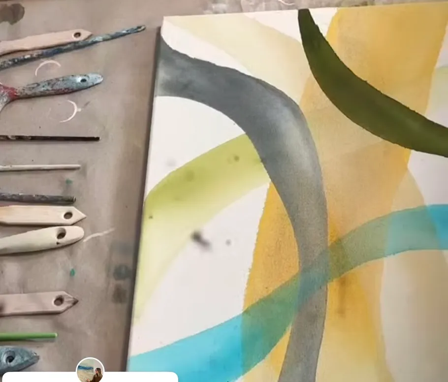 Abstract painting with tools on table.