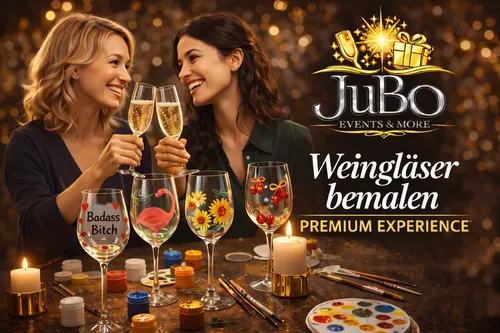 Zwei Frauen stoßen im Kunststudio an.