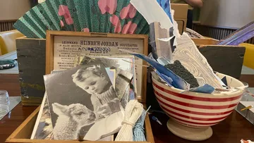 Craft materials in a wooden box and bowl.