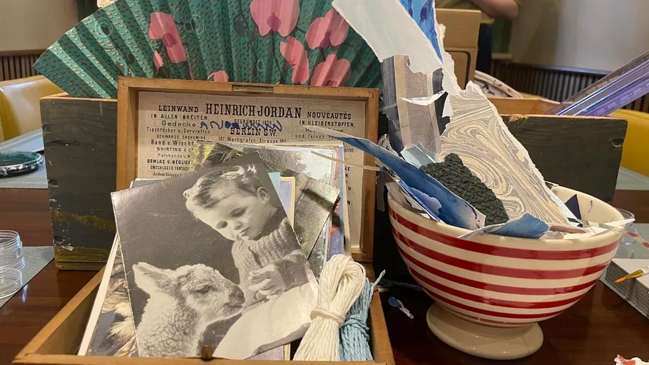 Craft materials in a wooden box and bowl.