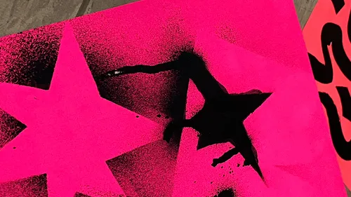 Pink stars with black paint splash.