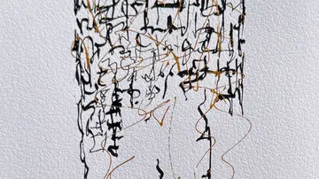 Abstrakte schwarze und goldene Linien auf Papier.