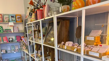 Shelves with colorful stationery and gift items.