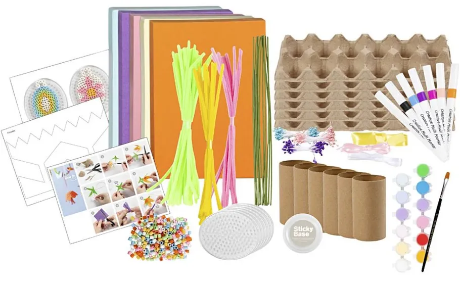 Craft materials arranged neatly on white background.