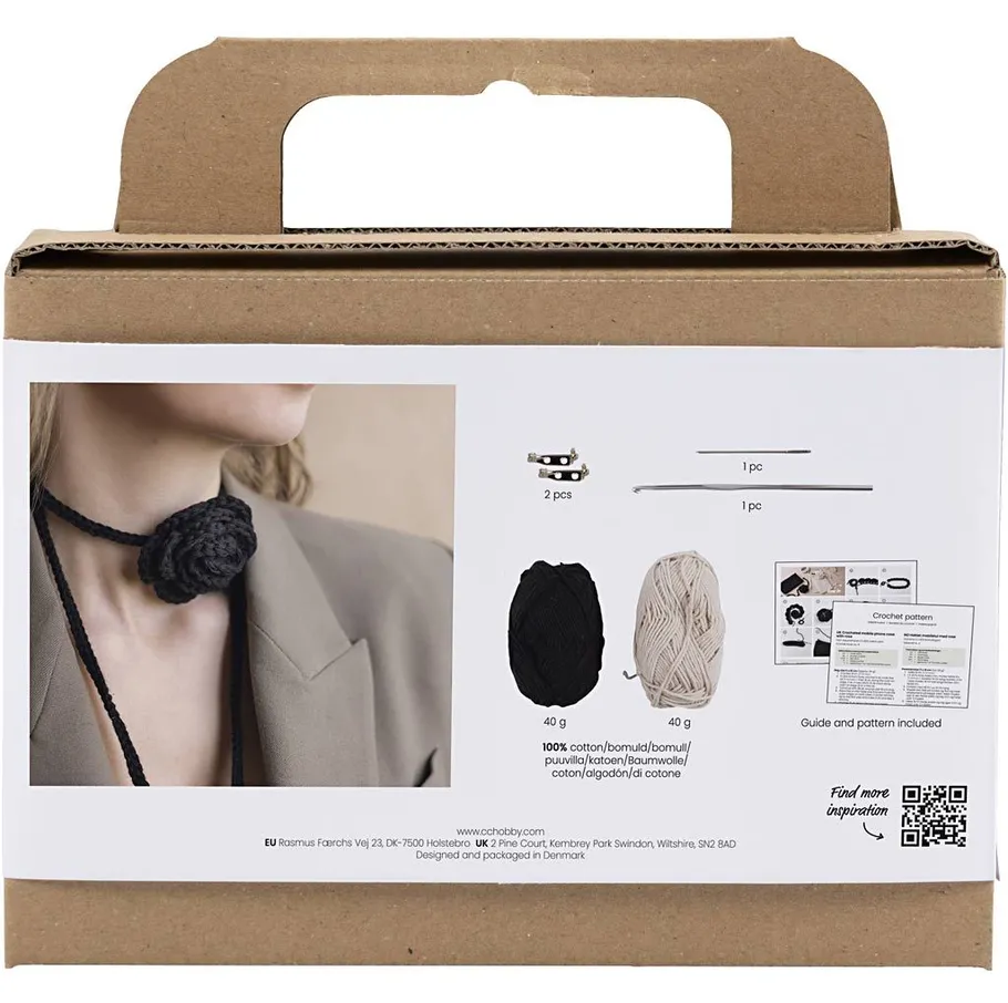 Häkelset-Box mit Garn und Anleitung.