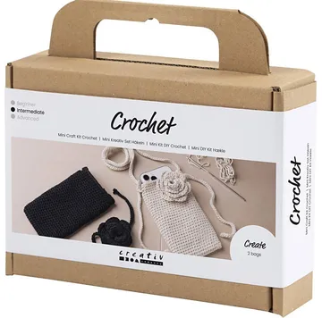 Crochet kit box with materials and tools.