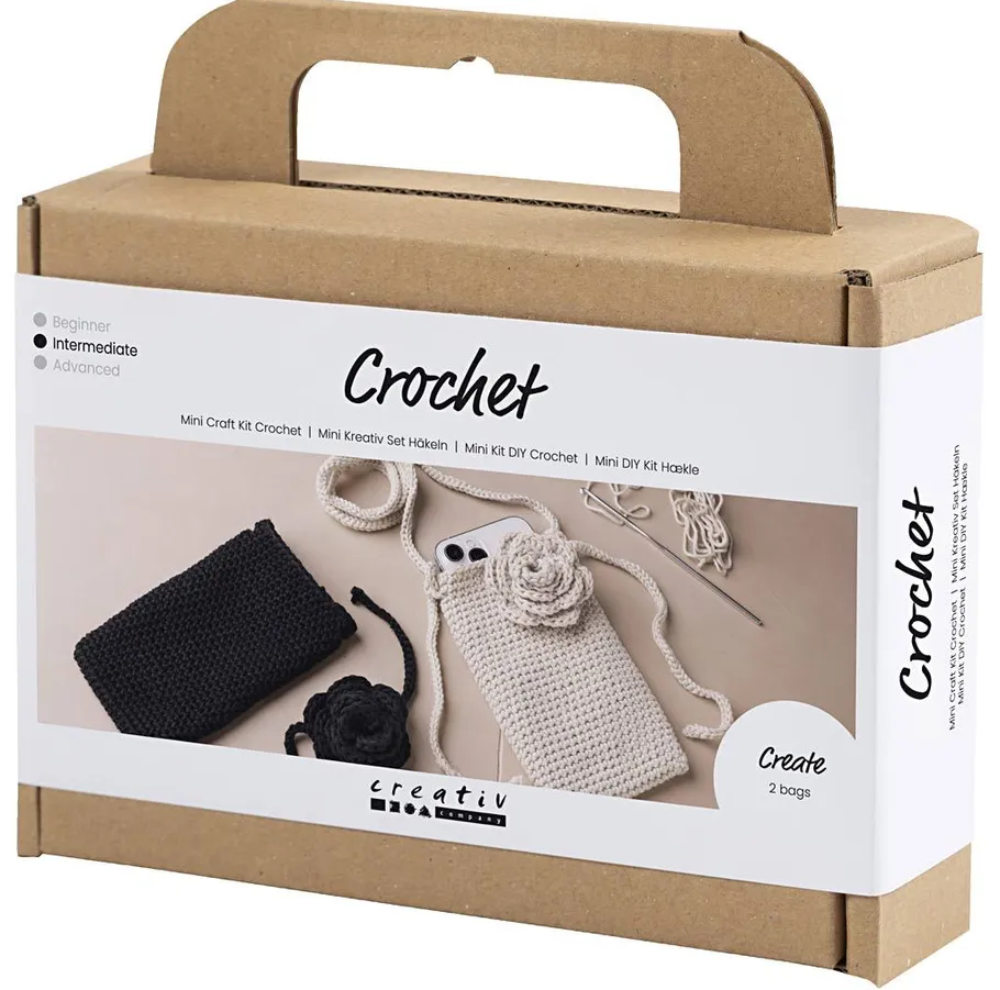 Häkelset-Box mit Materialien und Werkzeugen.