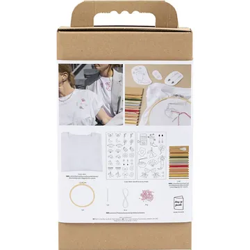 Embroidery kit with T-shirt and supplies displayed.