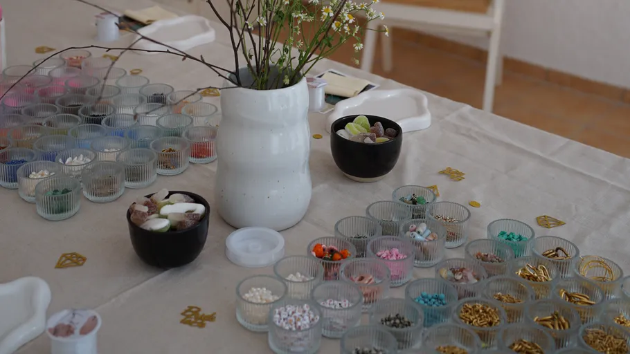 Craft supplies organized on a table surface.