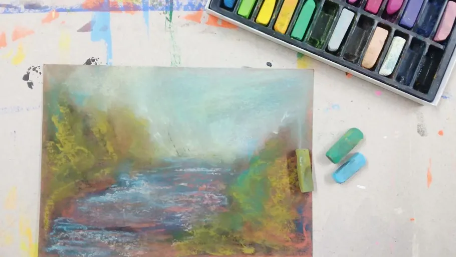Pastelllandschaft mit Pastellbox auf Tisch.