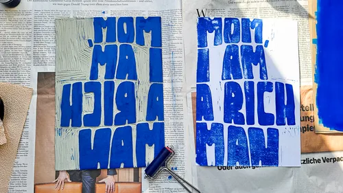 Woodblock and print read: 'Mom, I am a rich man.'