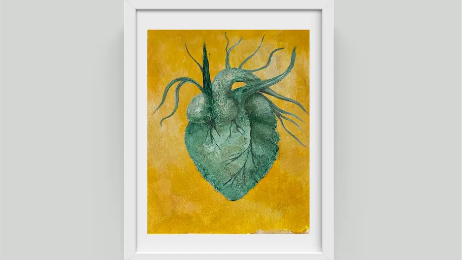 Green heart-shaped plant on yellow background.