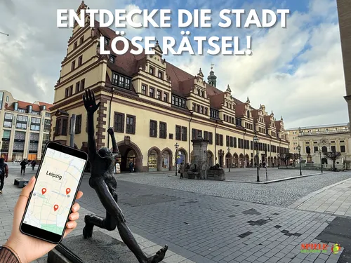 Hand holding phone in front of historic building.