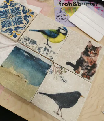 Decorative tiles with animal and floral designs.