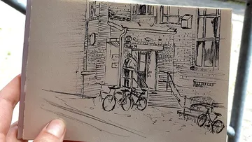 Drawing of building entrance with bicycles outside.
