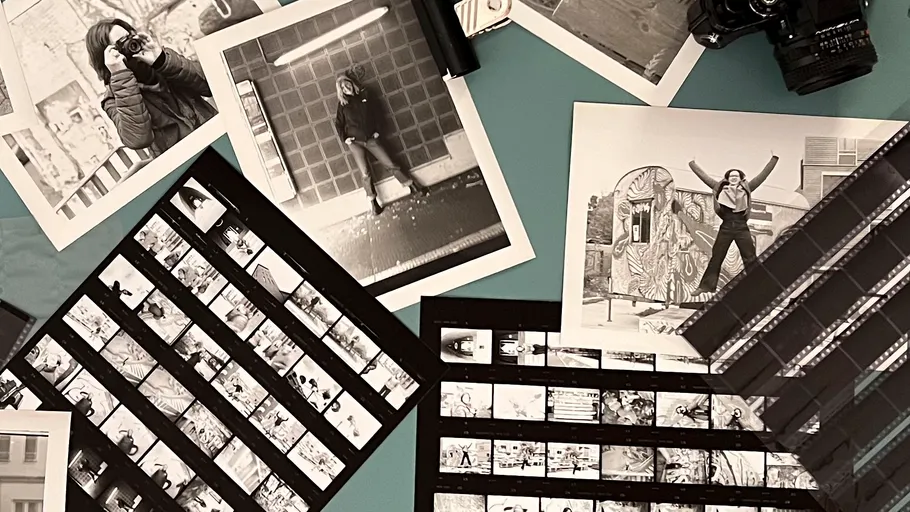 Black and white photos displayed on a table.