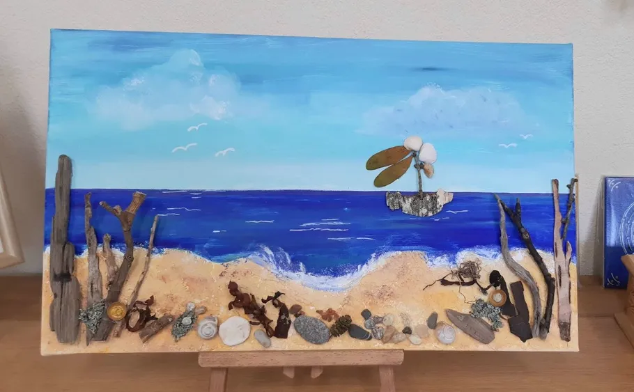 Mixed-media beach scene with ocean and driftwood.