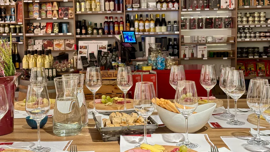 Set table with wine glasses in a store.