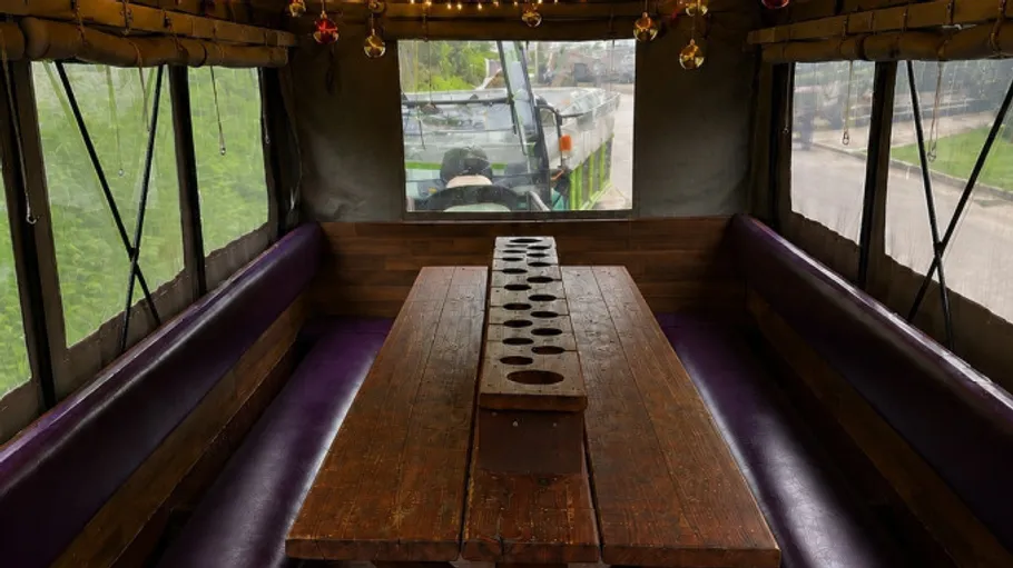 Wooden table inside a moving vehicle.