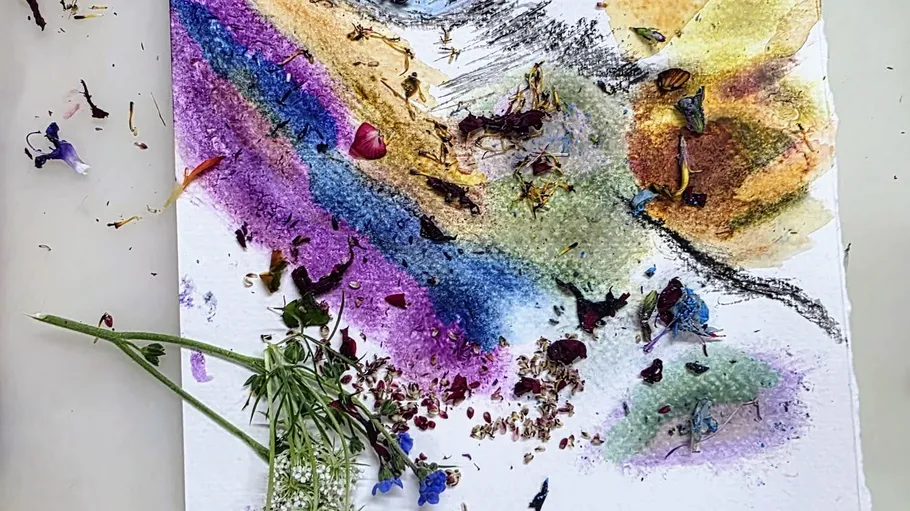 Colorful abstract painting with pressed flowers.